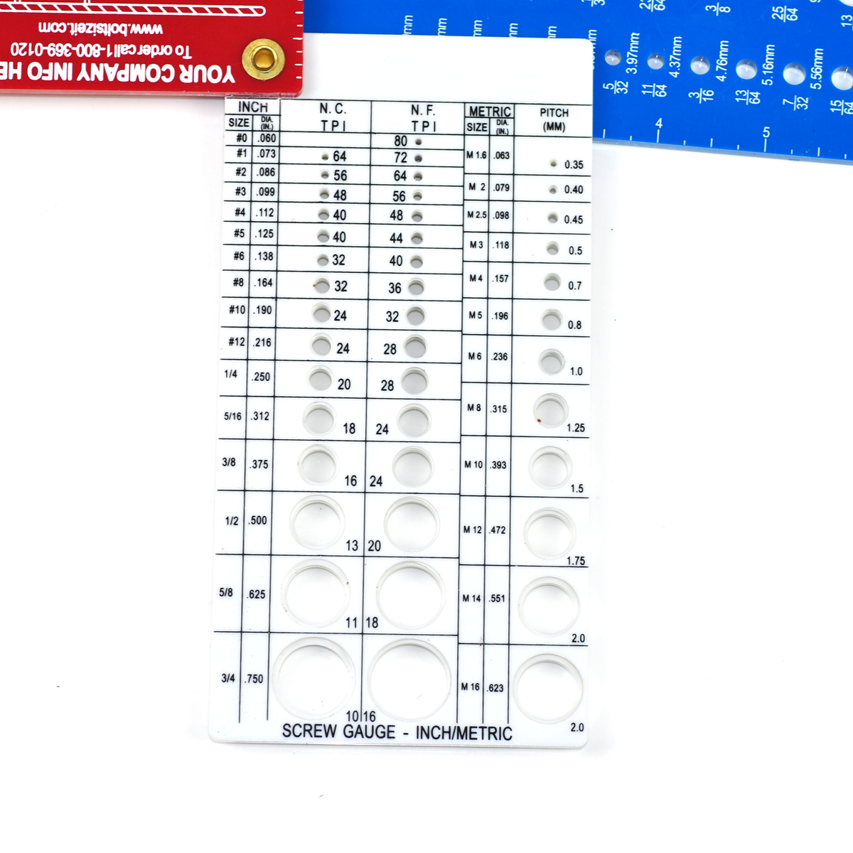 Flat plastic Rivet, Screw, and Drill Gauges, bolted together in a convenient pack with holes for measurement, displaying a close up of the Screw Gauge.